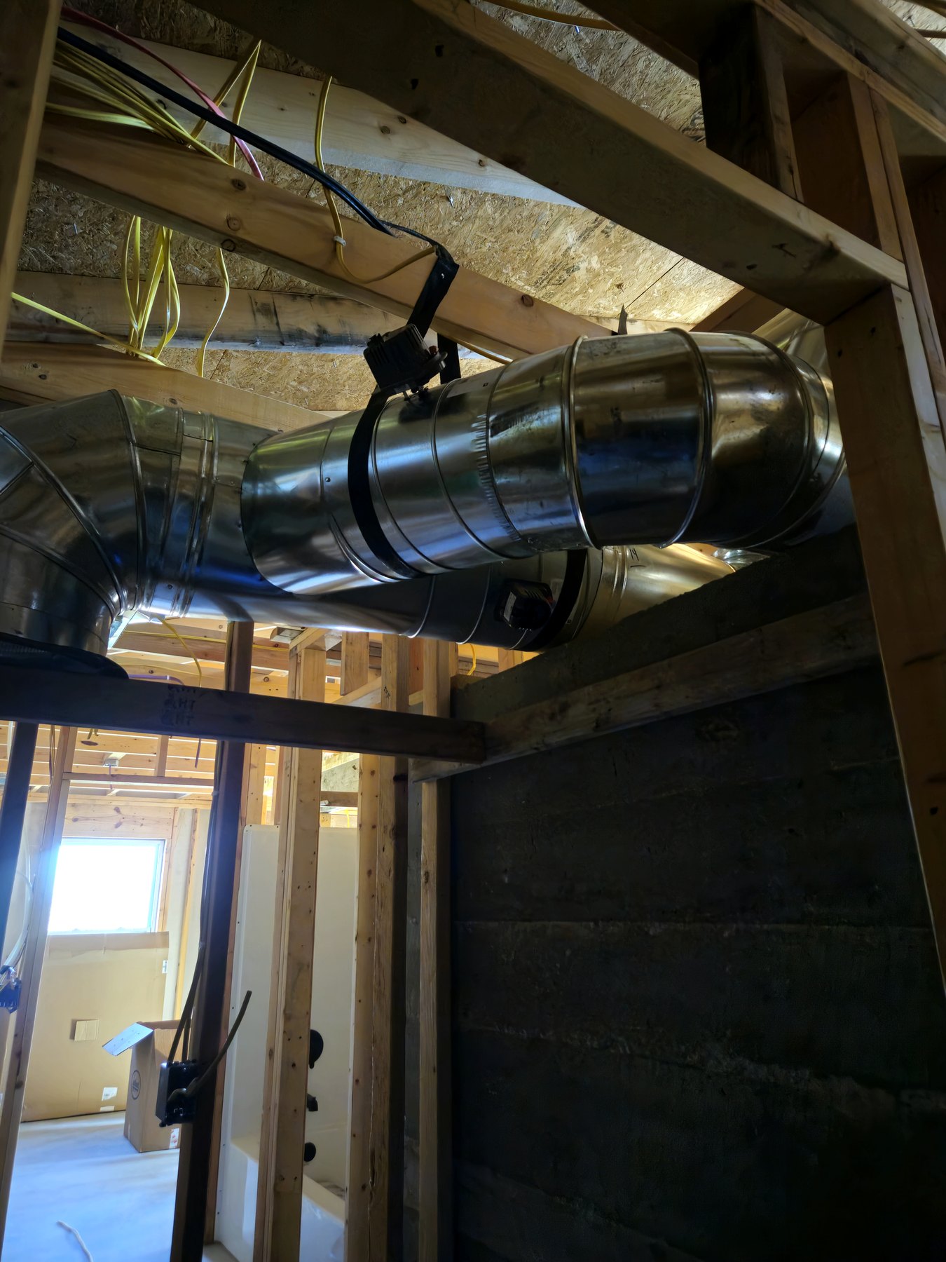 Ductwork and mechanical systems routed through a framed interior space