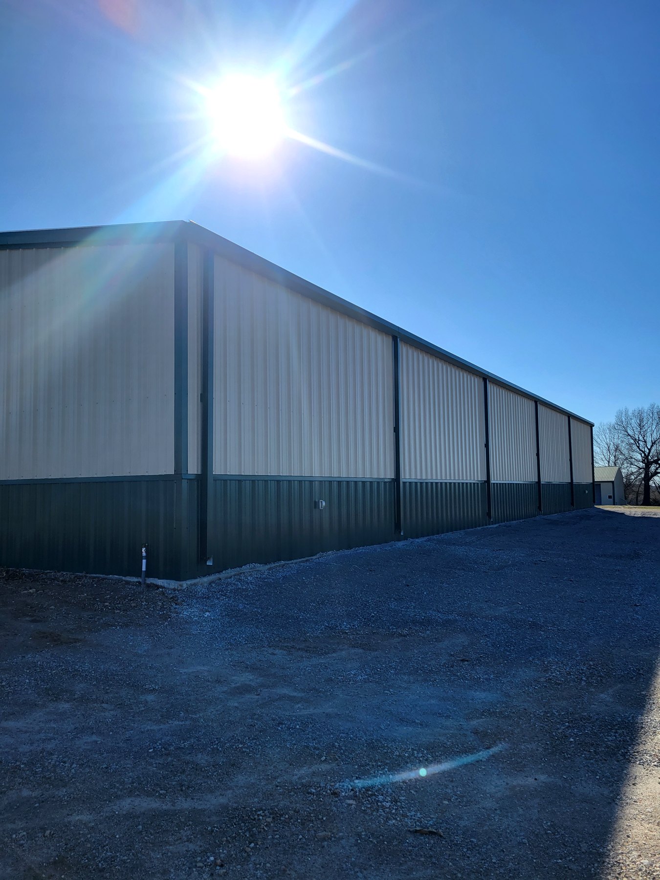 Long side elevation of a finished commercial metal building