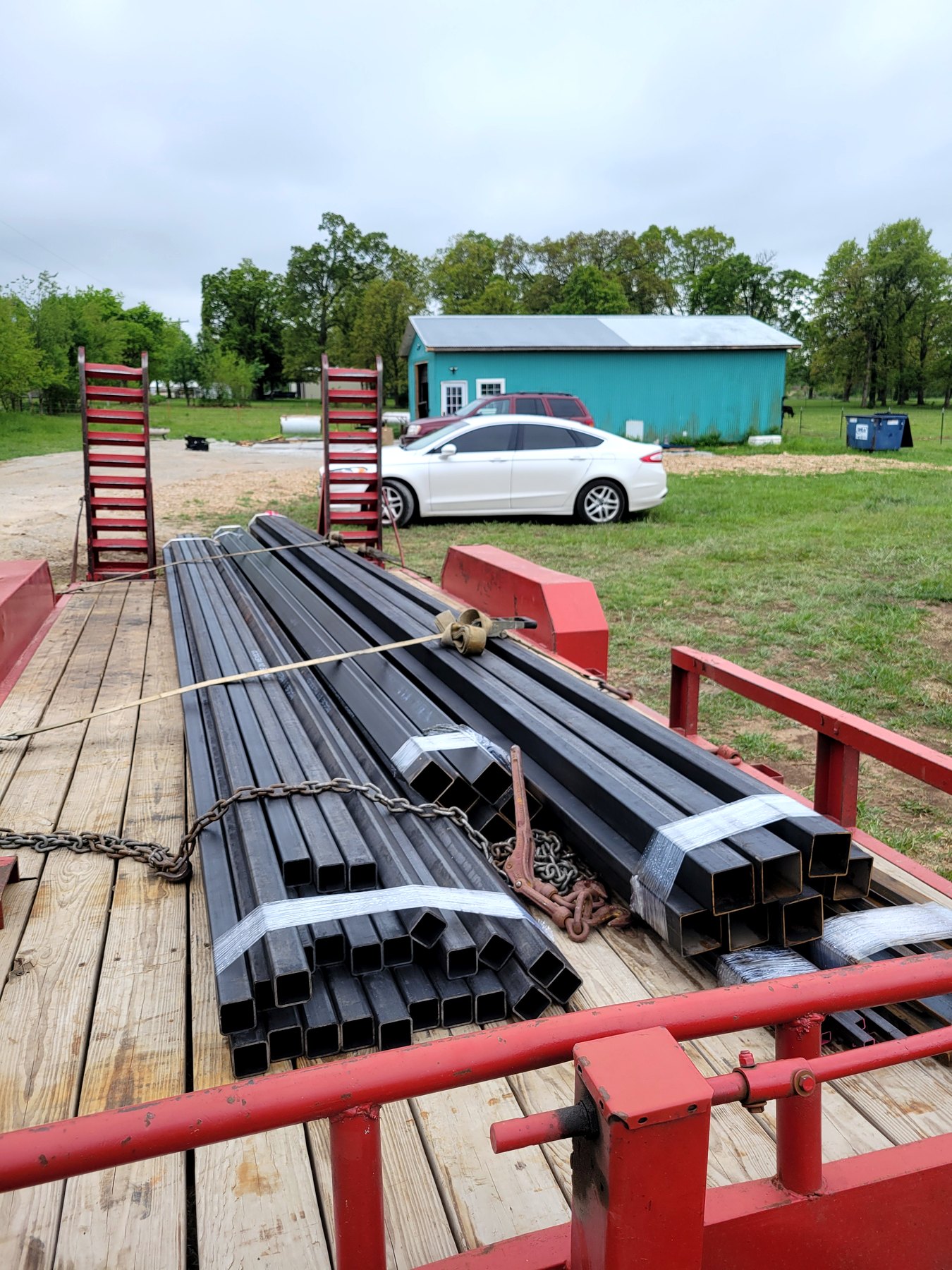 Steel material and components loaded on a trailer for fabrication or installation